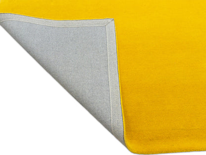 Sunflower yellow solid wool rug for living room or bedroom, handmade in India