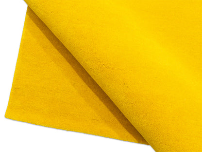 Handmade minimalist sunflower yellow solid rug, Bodhi Artisans wool area rug