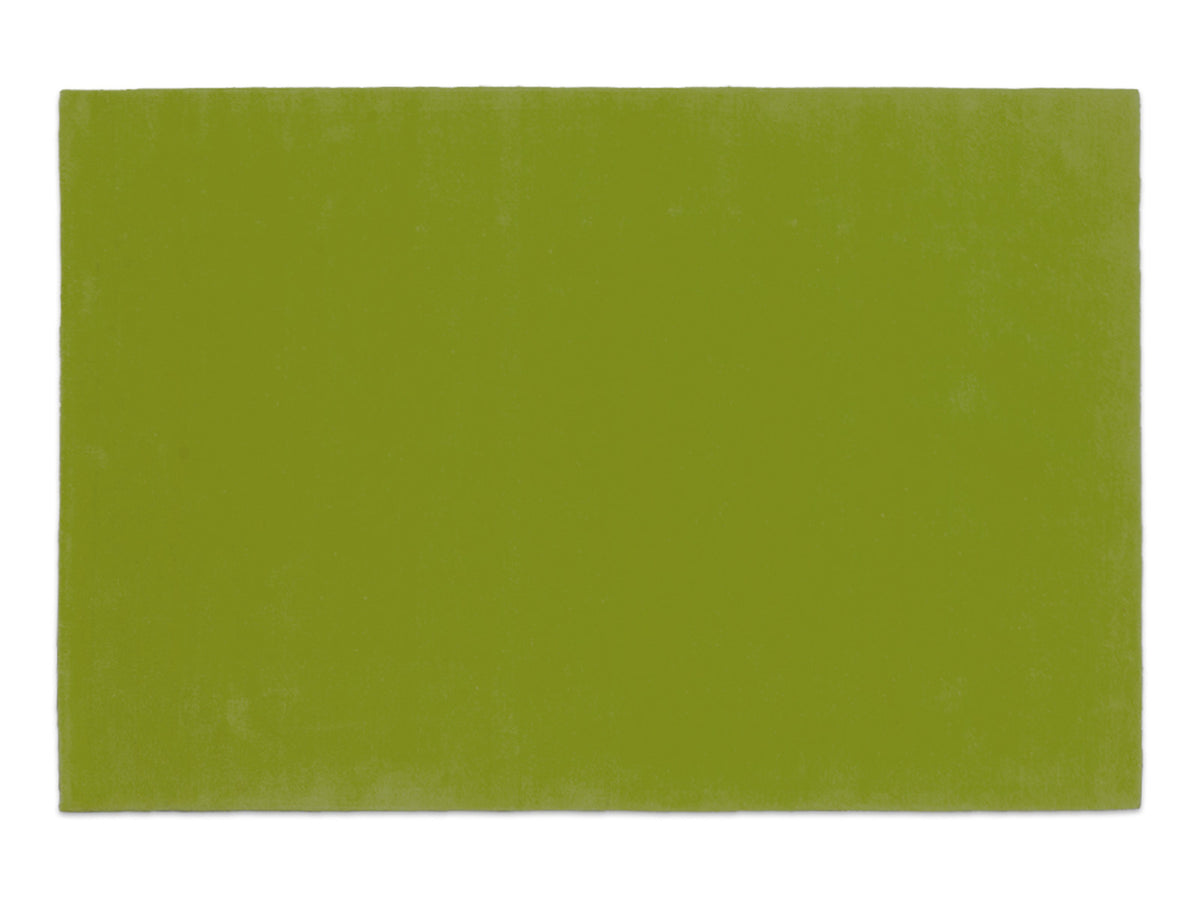 Handmade lime green solid wool area rug, minimalist style, made in India