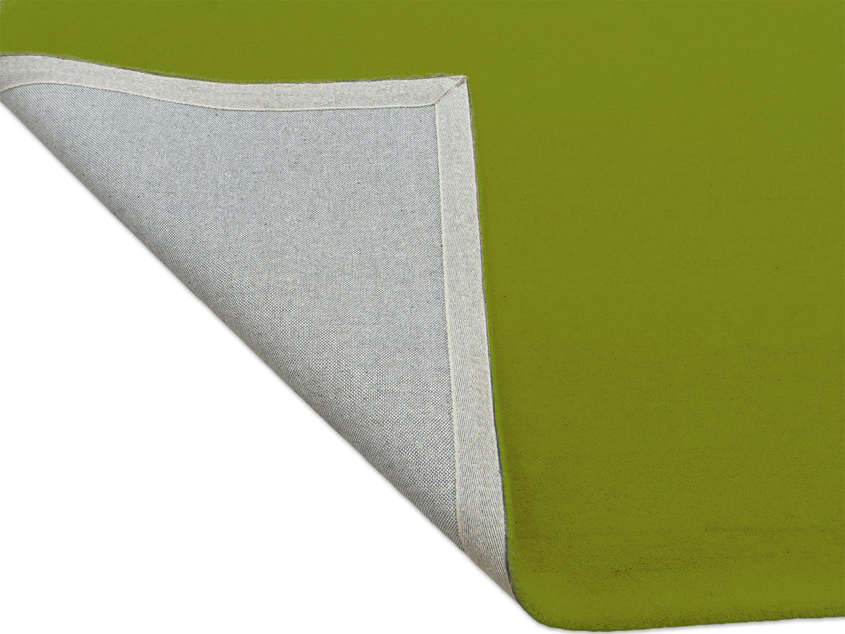 Handmade lime green solid wool area rug, minimalist style, made in India – photo 7