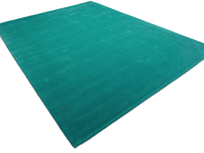 Minimalist teal solid area rug, handmade wool rug from India