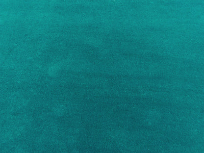 Handmade minimalist teal solid rug, Bodhi Artisans wool area rug