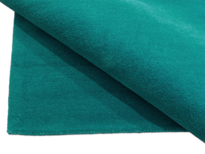 Handmade teal solid wool area rug, minimalist style, made in India – photo 7