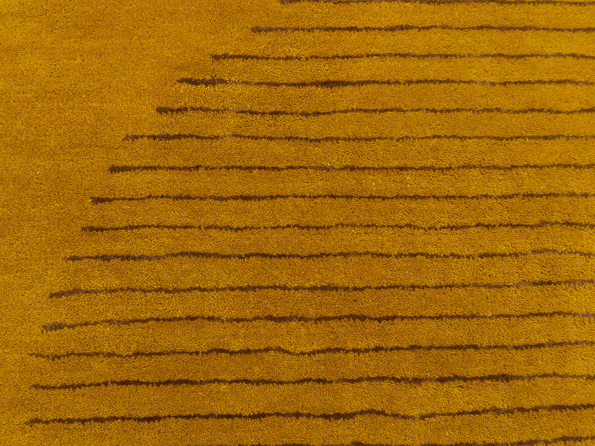 Peach gold geometric wool rug for living room or bedroom, hand-tufted in India